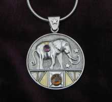 silver pendant with elephant